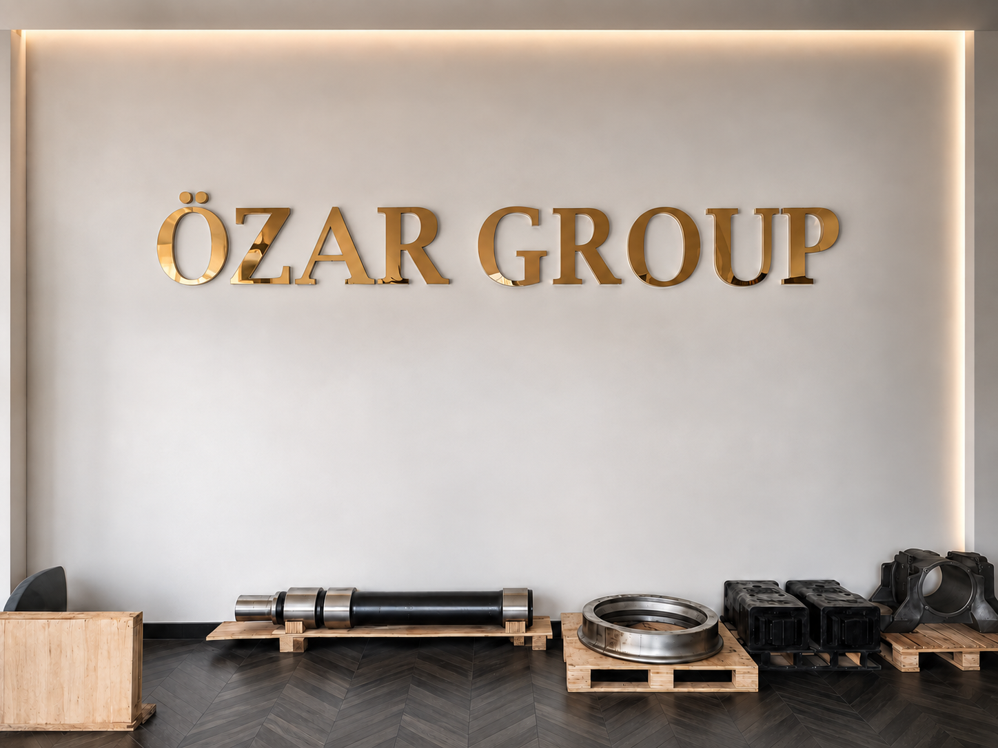 Özar Group giriş holü — ÖZAR GROUP duvar yazısı